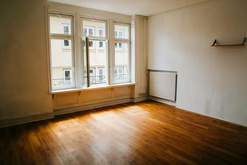 Empty sunlit room ready for inspection after an end-of-tenancy clean D&A Cleaning Ltd
