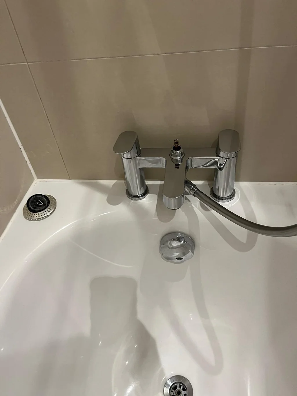 Bath filler taps shining after descale
