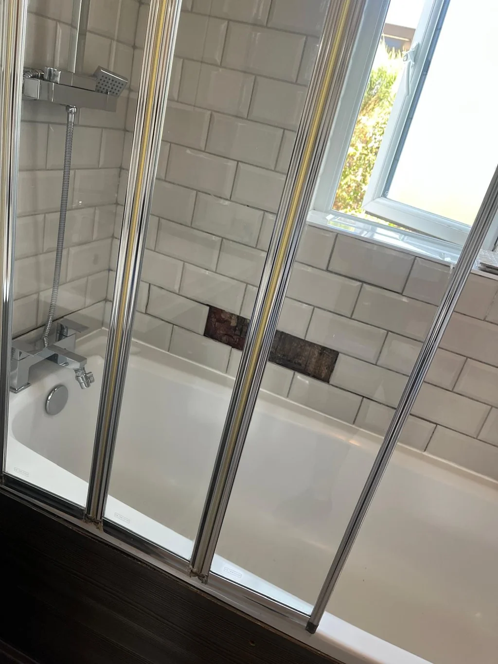 Folding bath shower screen clear after limescale removal