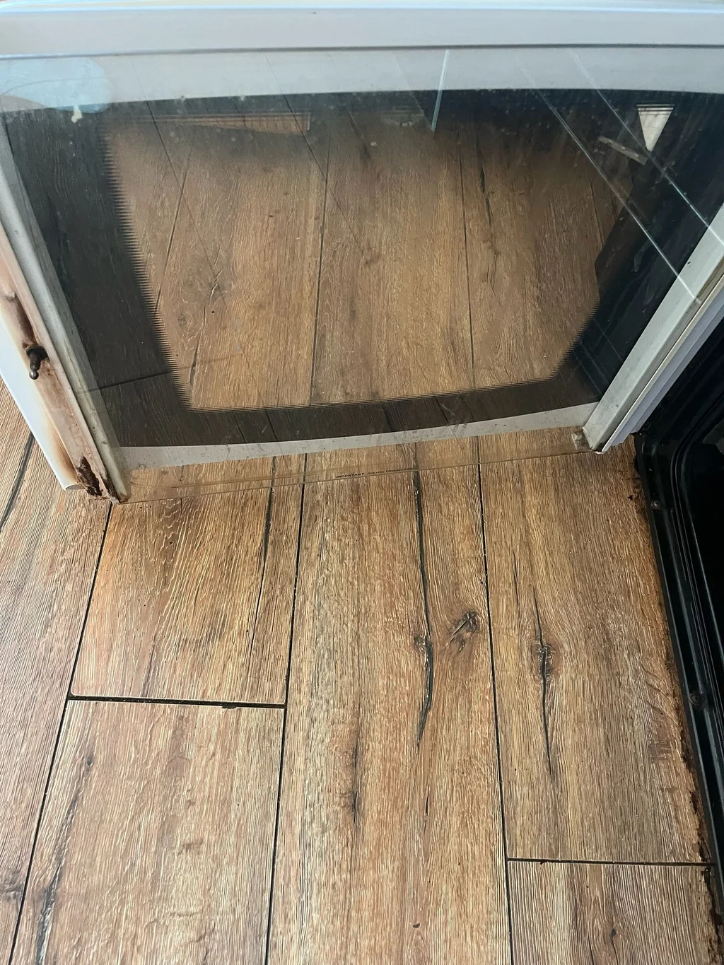Oven door glass restored to a clear shine