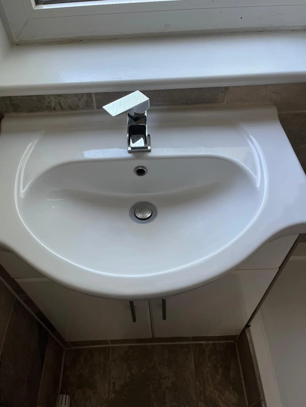 Bathroom basin and vanity spotless for a move-in clean D&A Cleaning Ltd Woodford