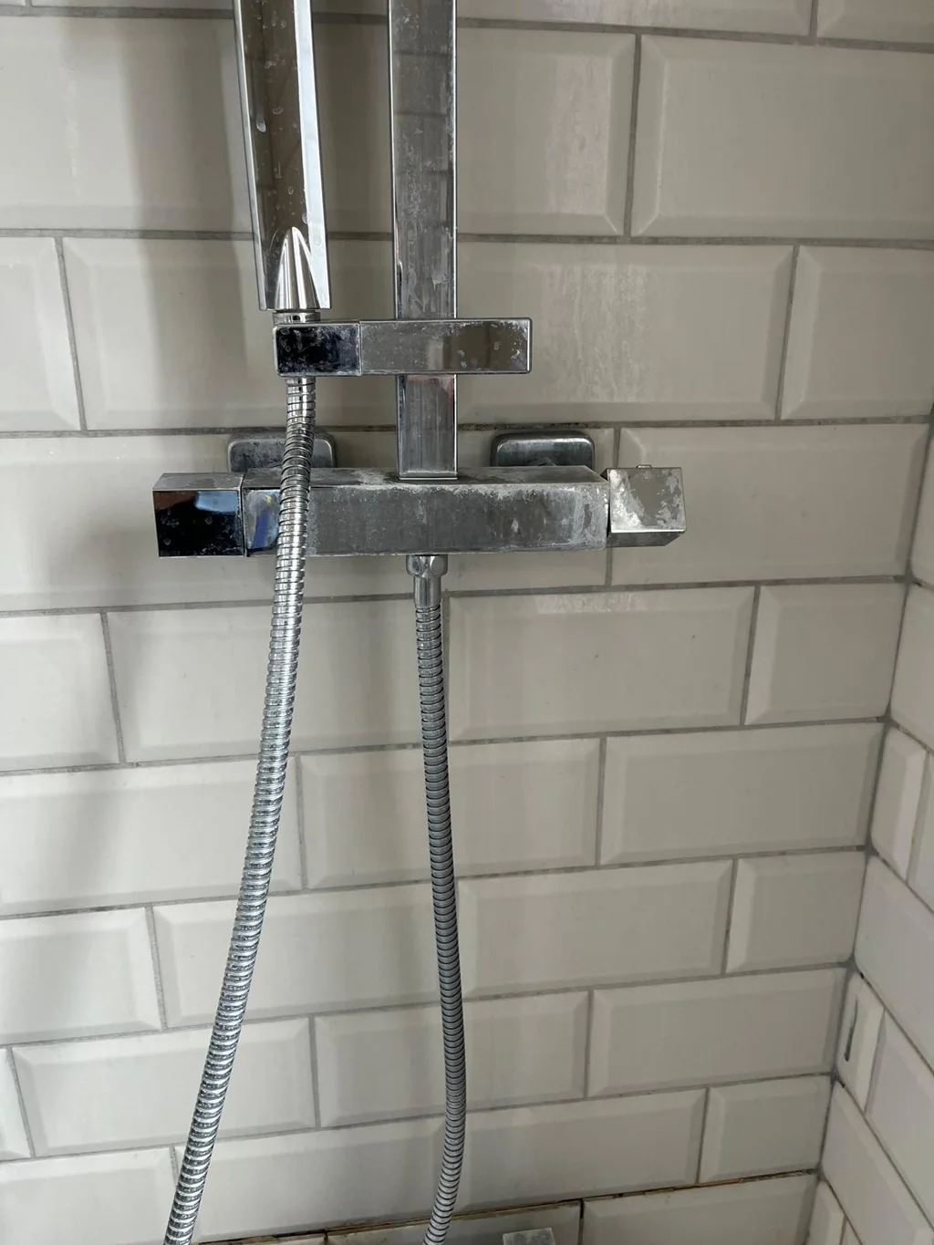 Shower valve and metro tiles dulled before a thorough clean